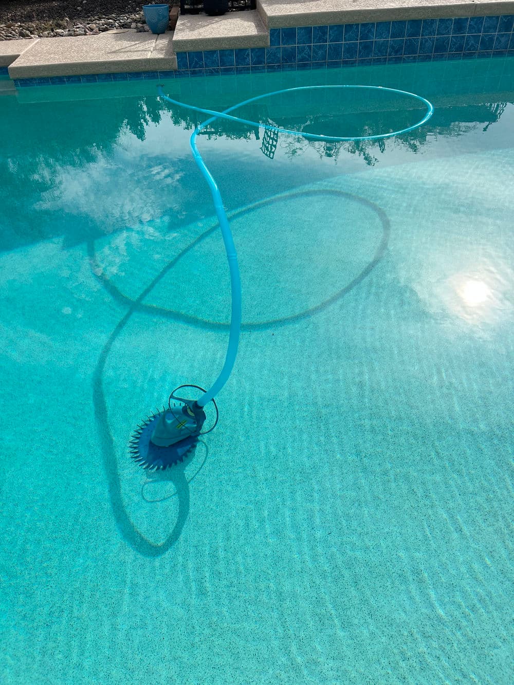 Clean and sparkling swimming pool maintained by Litchfield Park Pool Service